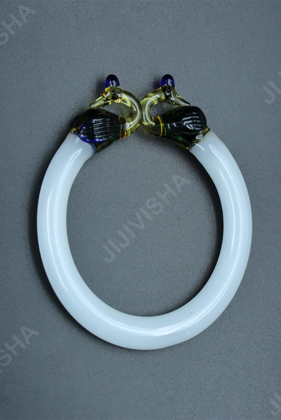 Buy Crystal White Bangles with Peacock Ends Online