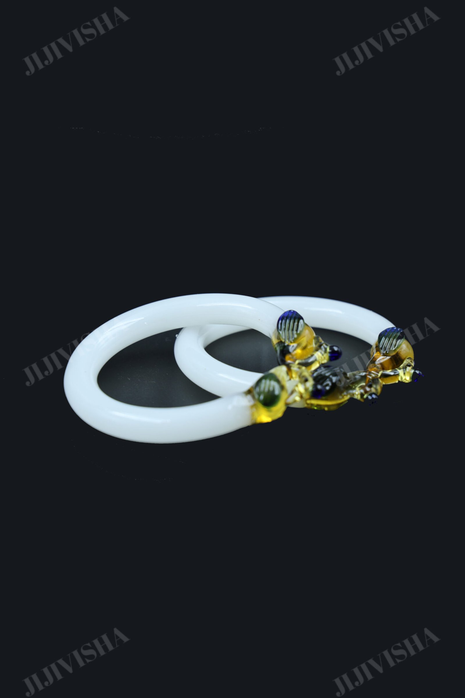 Buy Crystal White Bangles with Peacock Ends Online