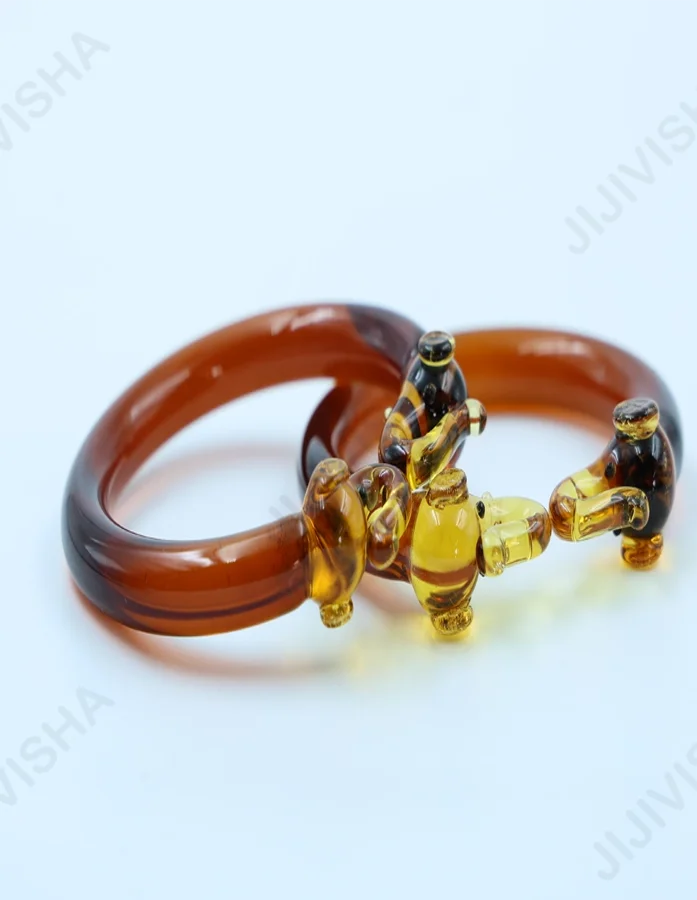 Crystal Brown Bangle with Elephant Ends