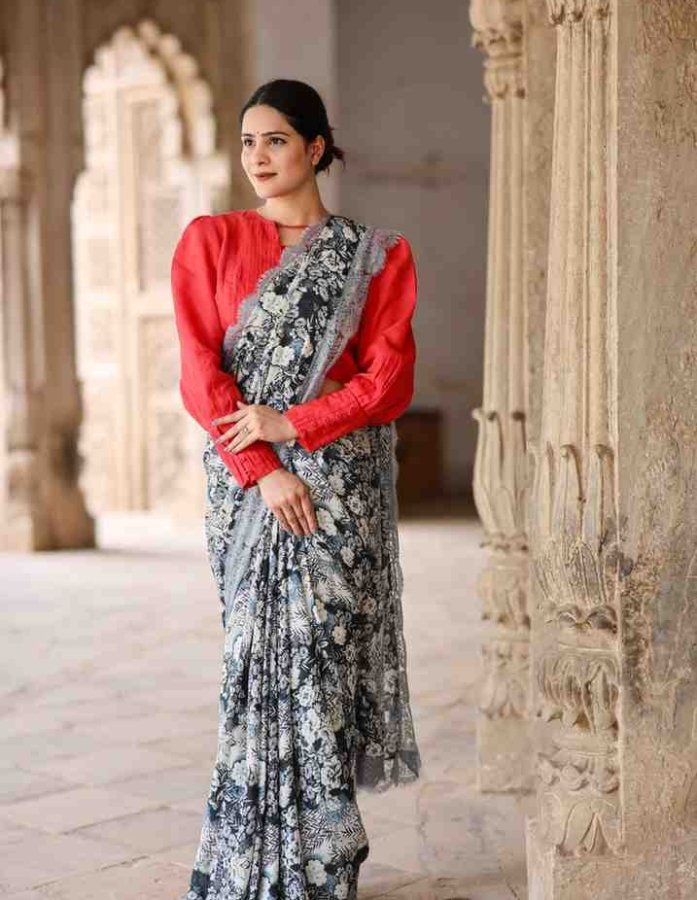 Radiate Grace and Charm: Floral Crepe Saree with Lace Border