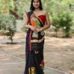 Artistic Allure: Black Cotton Saree with Applique Work