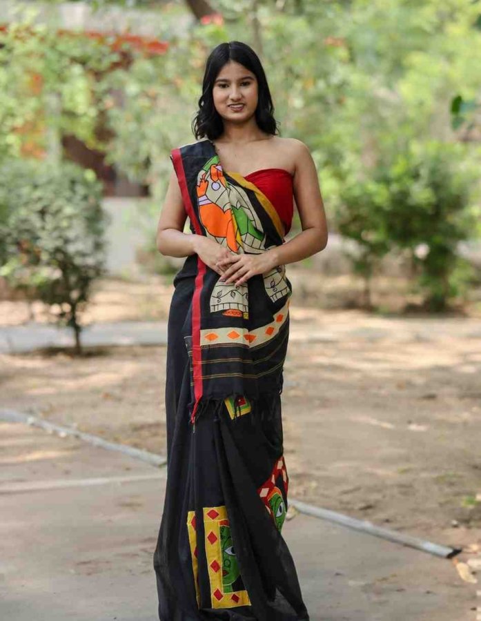 Artistic Allure: Black Cotton Saree with Applique Work