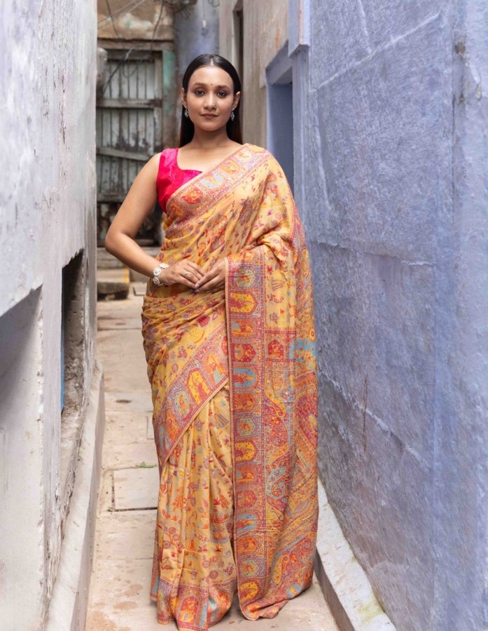Mustard Kani Silk Saree with Raja Rani Motifs