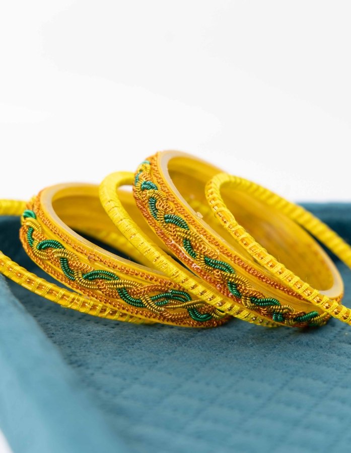 Yellow Bangles Set with Green and Red Accents
