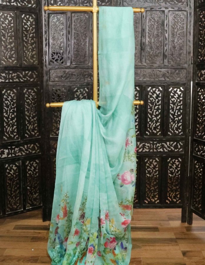 Stunning Sea Green Floral Printed Saree In Supernet Fabric